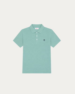 Polo Beviá de punto piqué en color verde grisáceo con cuello clásico, tres botones y logo bordado en el pecho